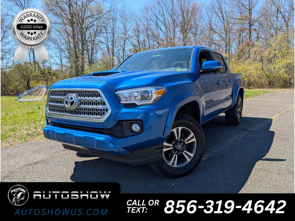 Blazing Blue Pearl 2016 Toyota Tacoma Double Cab V6 TRD Sport 4WD Pickup Truck Four-Wheel Drive 6-Speed Manual